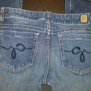 Guess Jeans with G's on the pockets